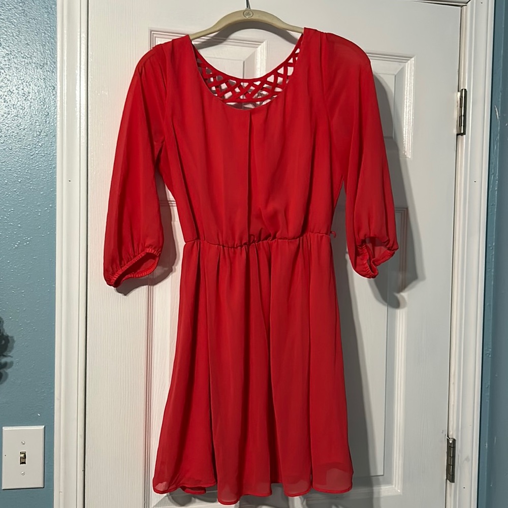 Salmon colored mini dress with chiffon overlay. Flowy!
